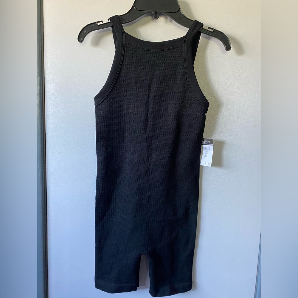 black shorts body suit